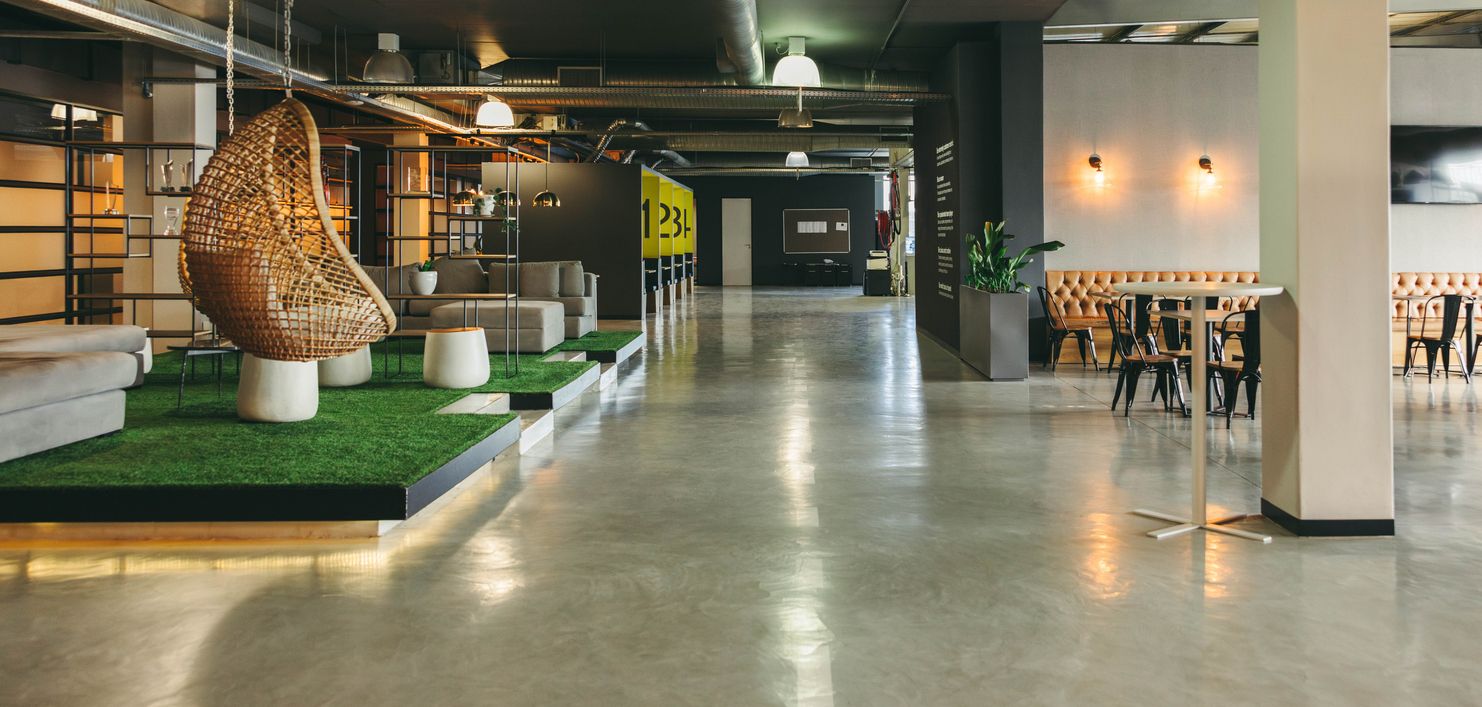 Completed business interior with polished concrete flooring and modern tenant finish design
